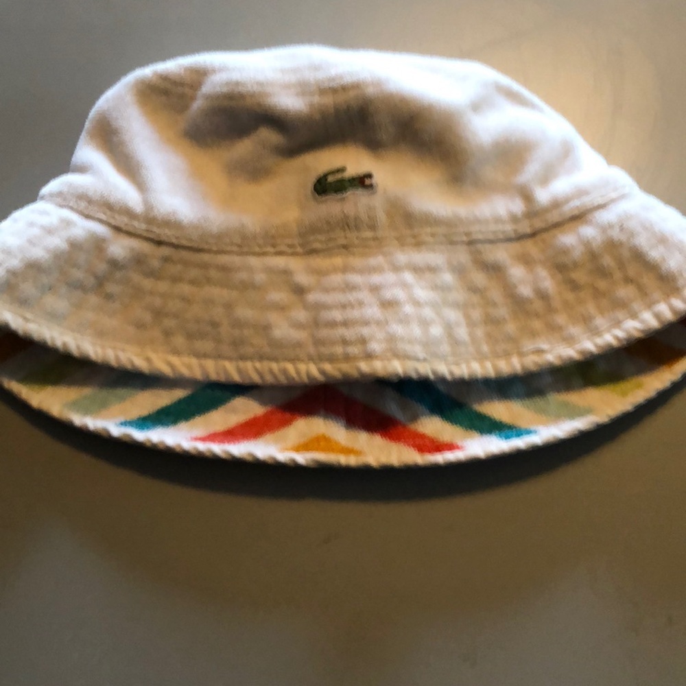 Lacoste reversible infant swim hat.